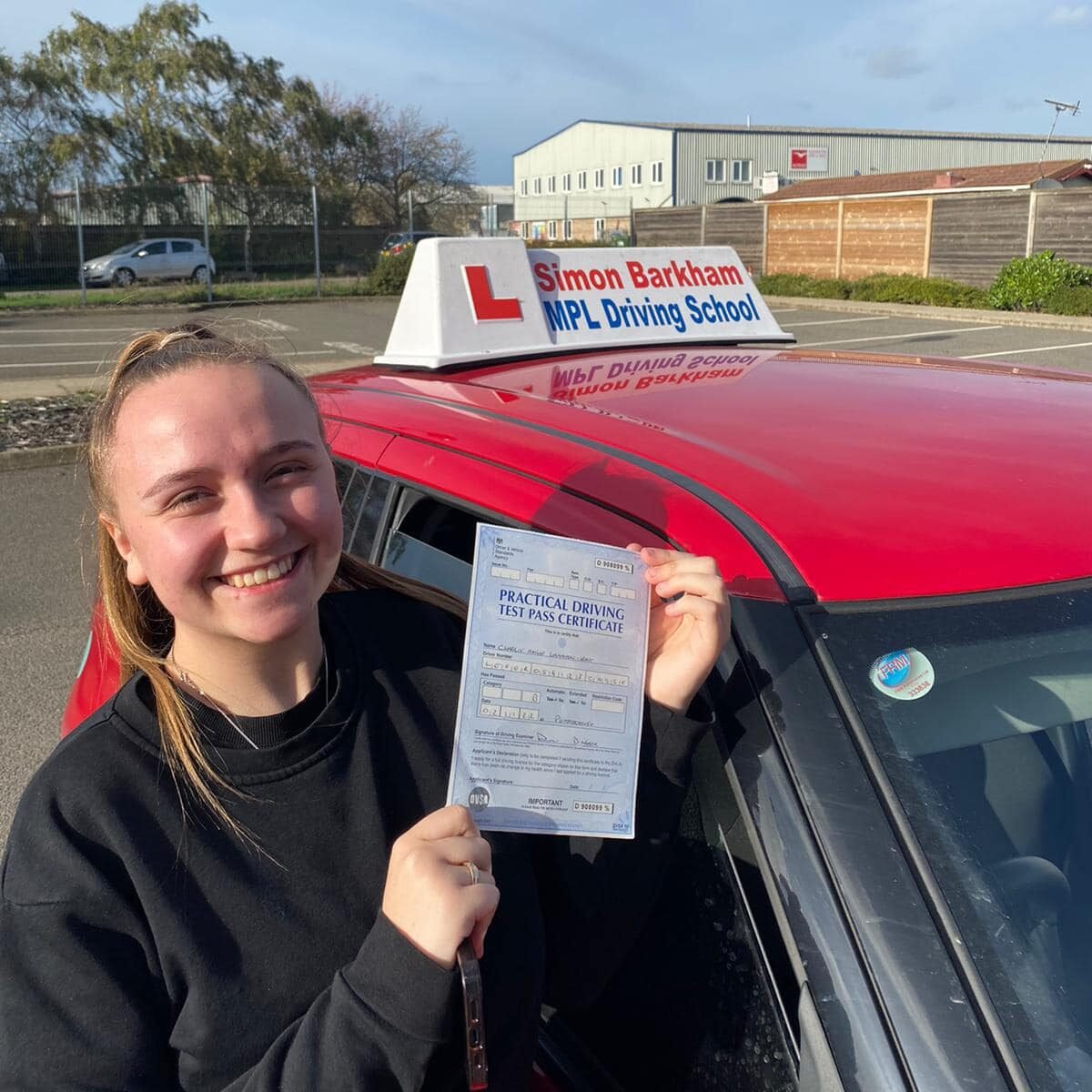 MPL Driving School pupil with instructor after passing